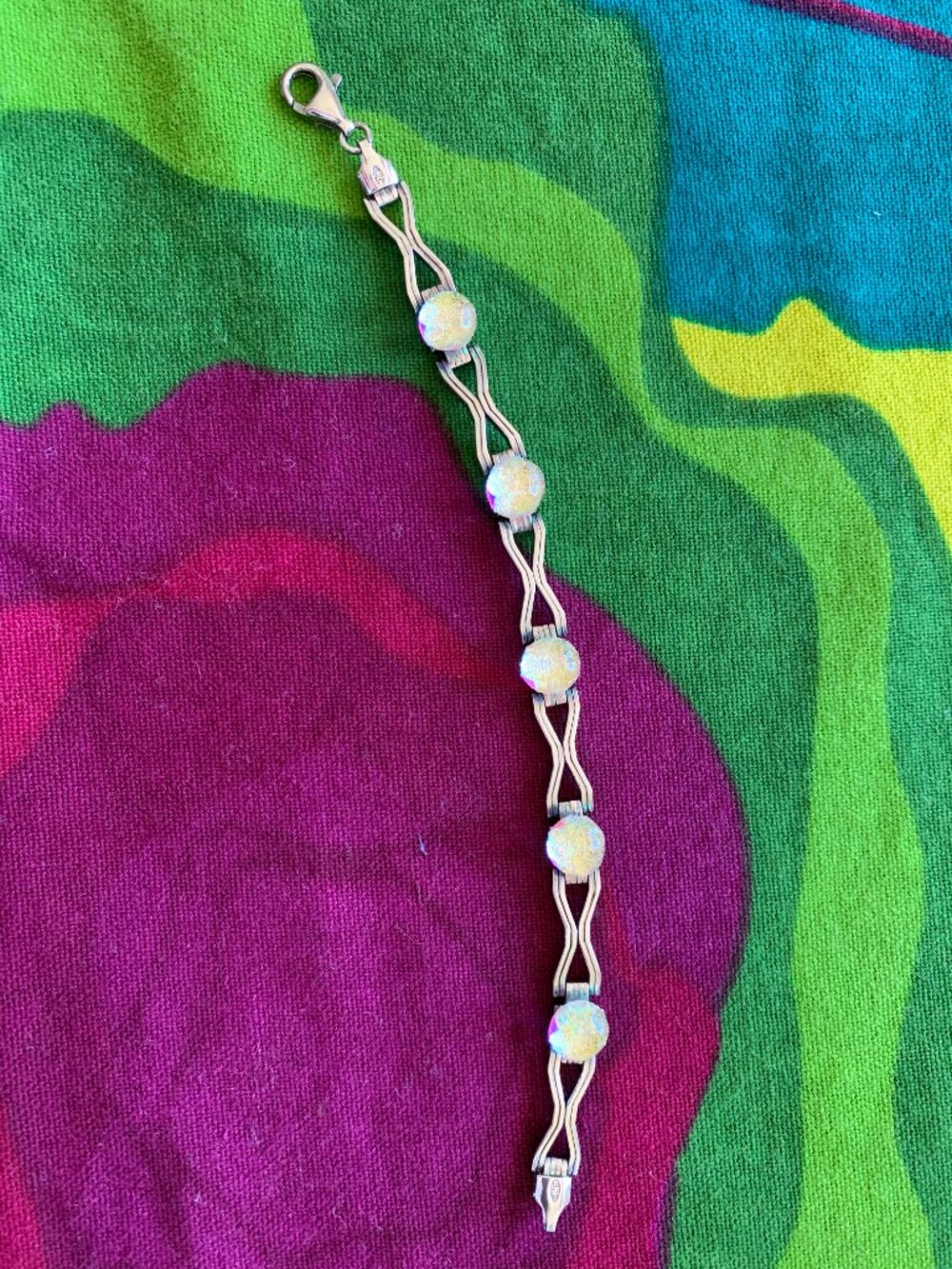 STERLING SILVER BRACELET WITH CIRCLES OF DICHROIC GLASS